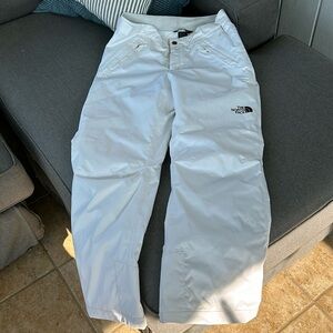 north face white snow pants.  Size girls XL (or women’s small)